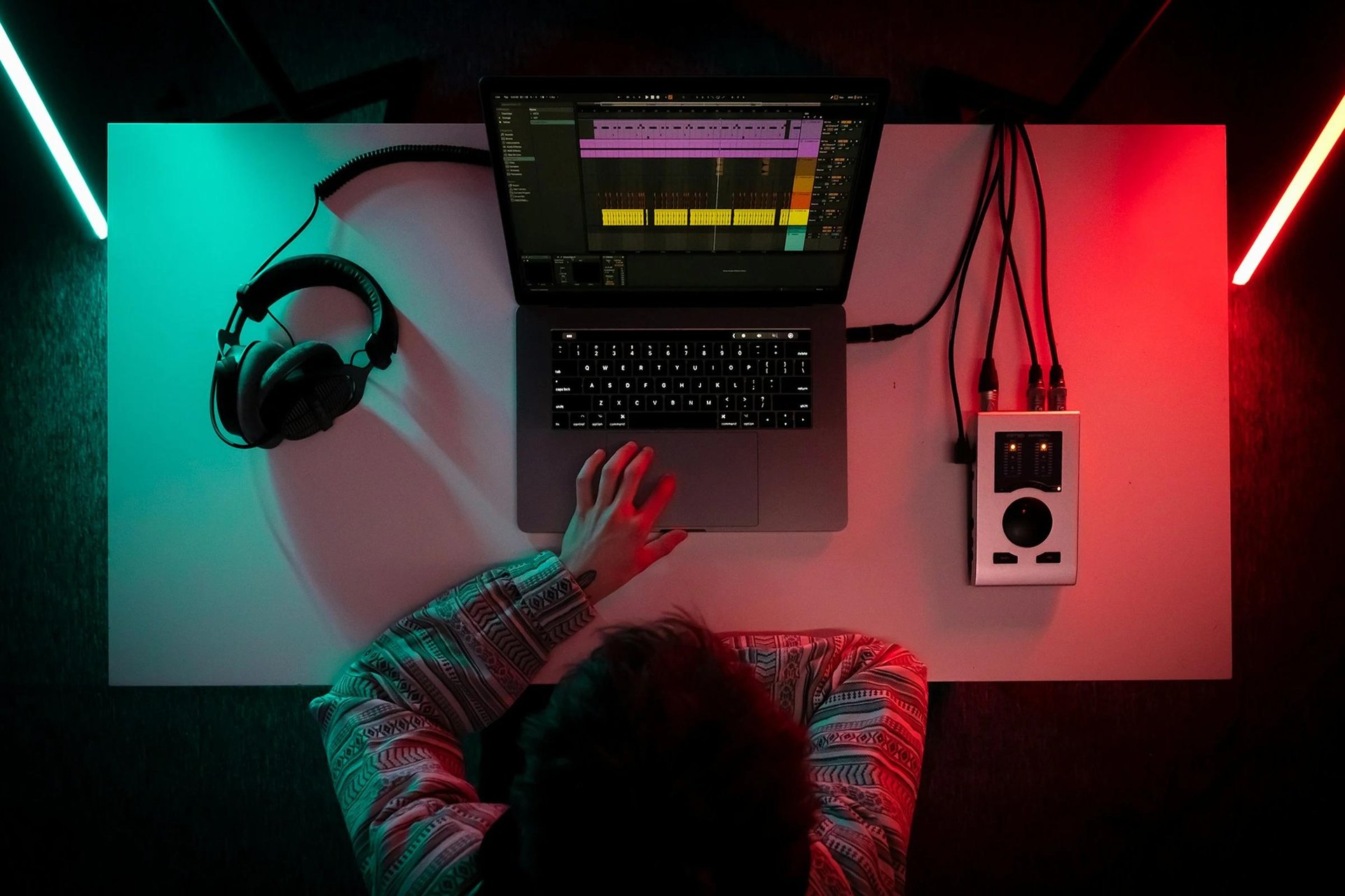 person working on laptop - AI Music Production