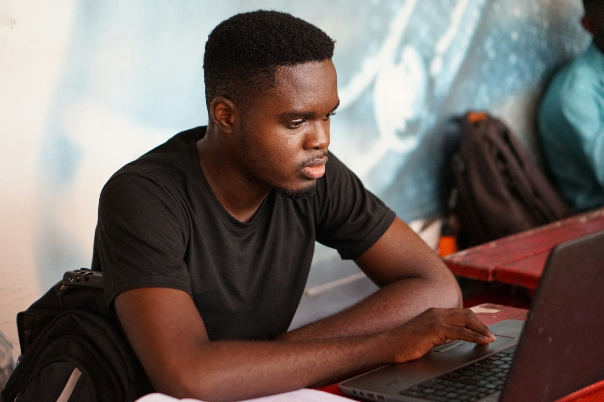 Man Using Laptop - Kits AI Alternatives